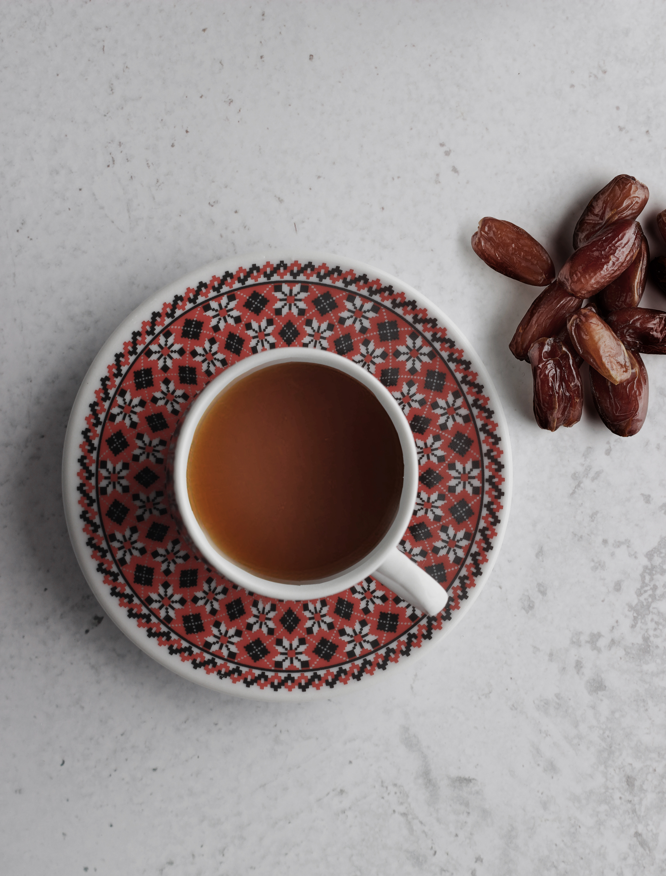 Cup of coffee with dried dates by ahmed omar