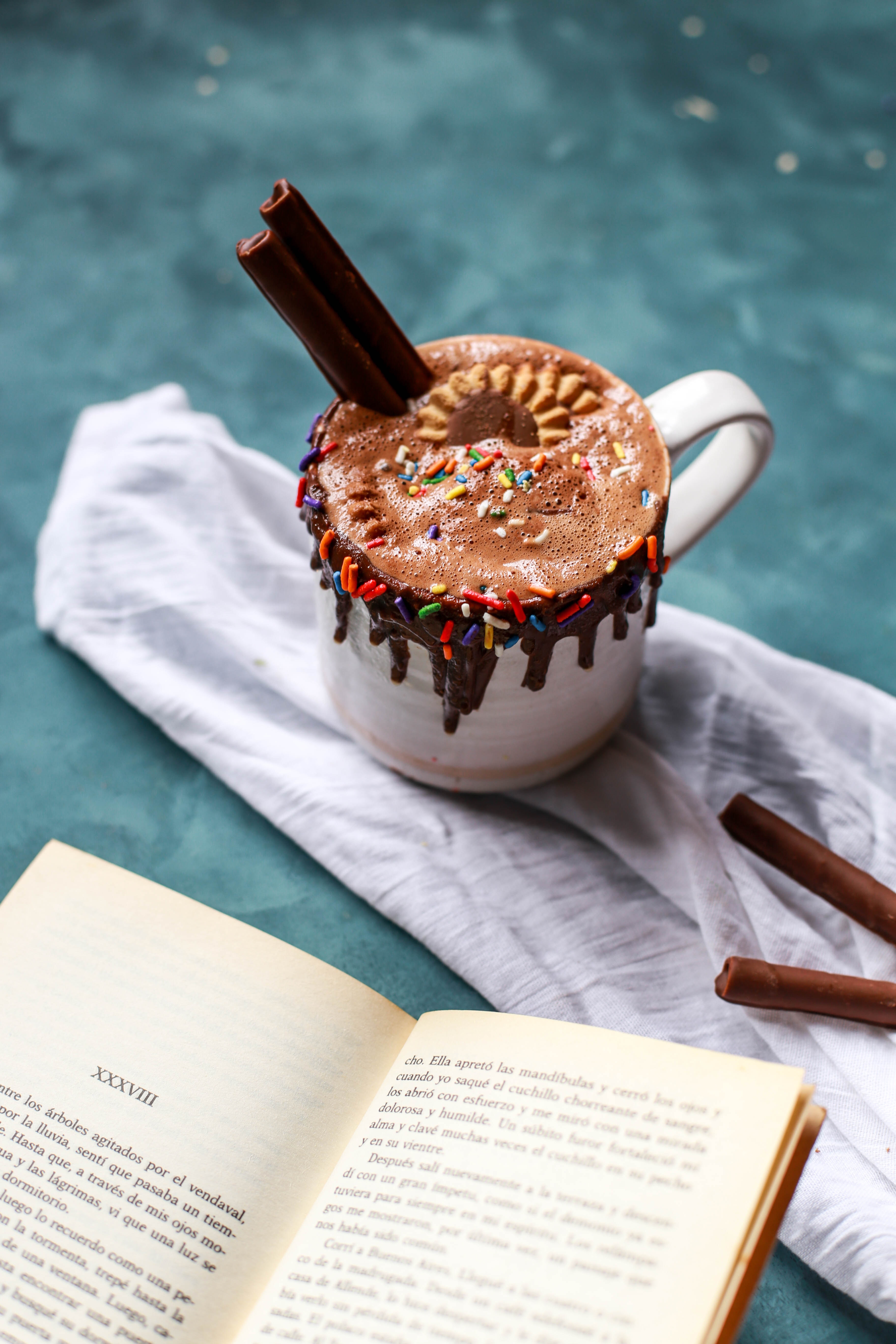 Hot chocolate mug with cinnamon by Brenda Godinez