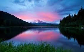  Beautiful Pink Sky above a clear lake.