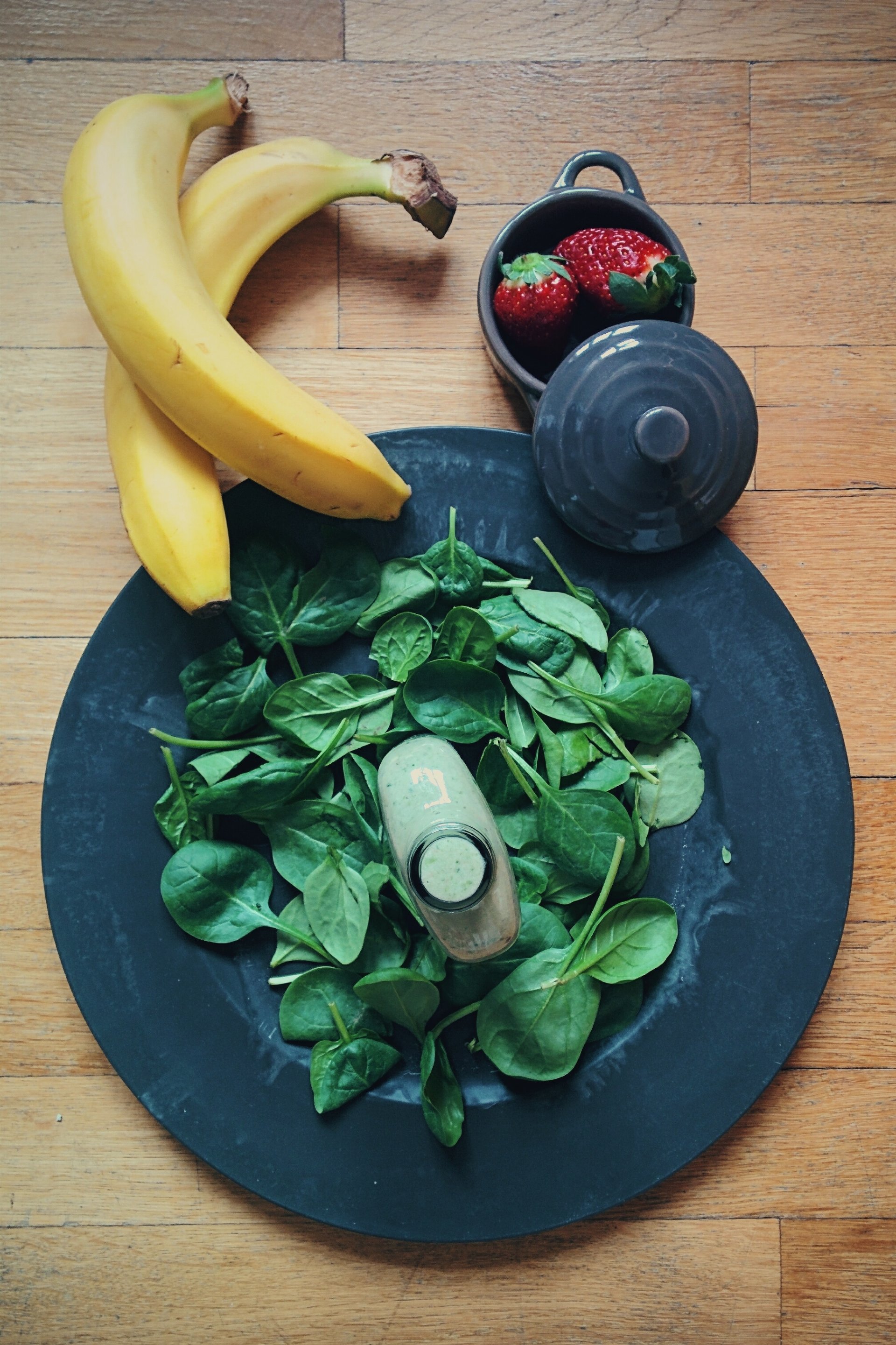  Homemade green smoothie with ingredients by Jakub Kapusnak