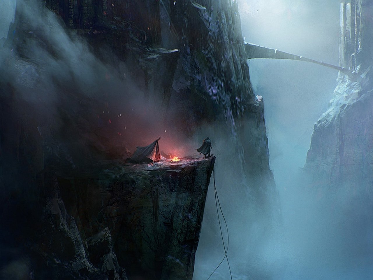 A mysterious fantasy landscape shows a figure by a campfire on a cliff, enveloped in mist, with a distant bridge arching over the rocky terrain.