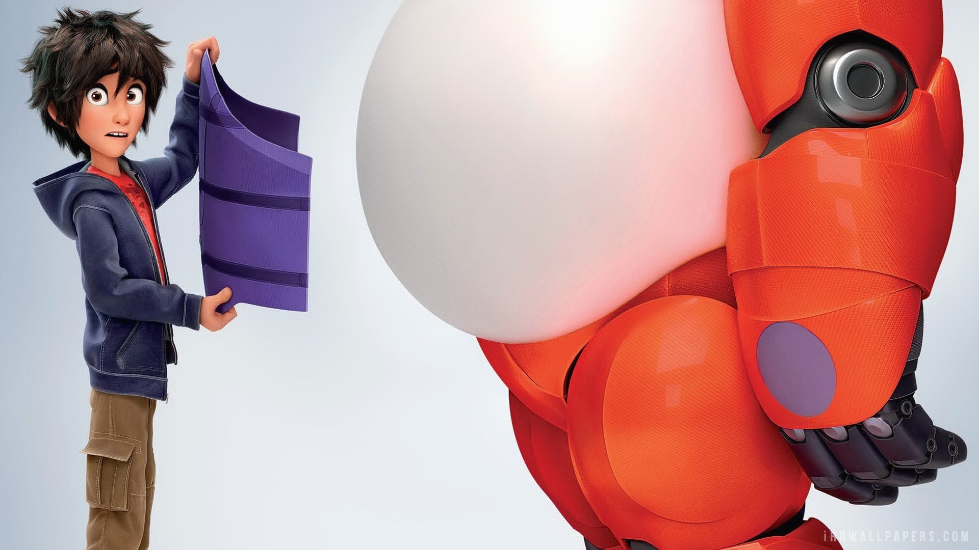 A scene from the movie Big Hero 6, featuring Hiro holding a purple sheet while interacting with Baymax, the friendly healthcare robot.