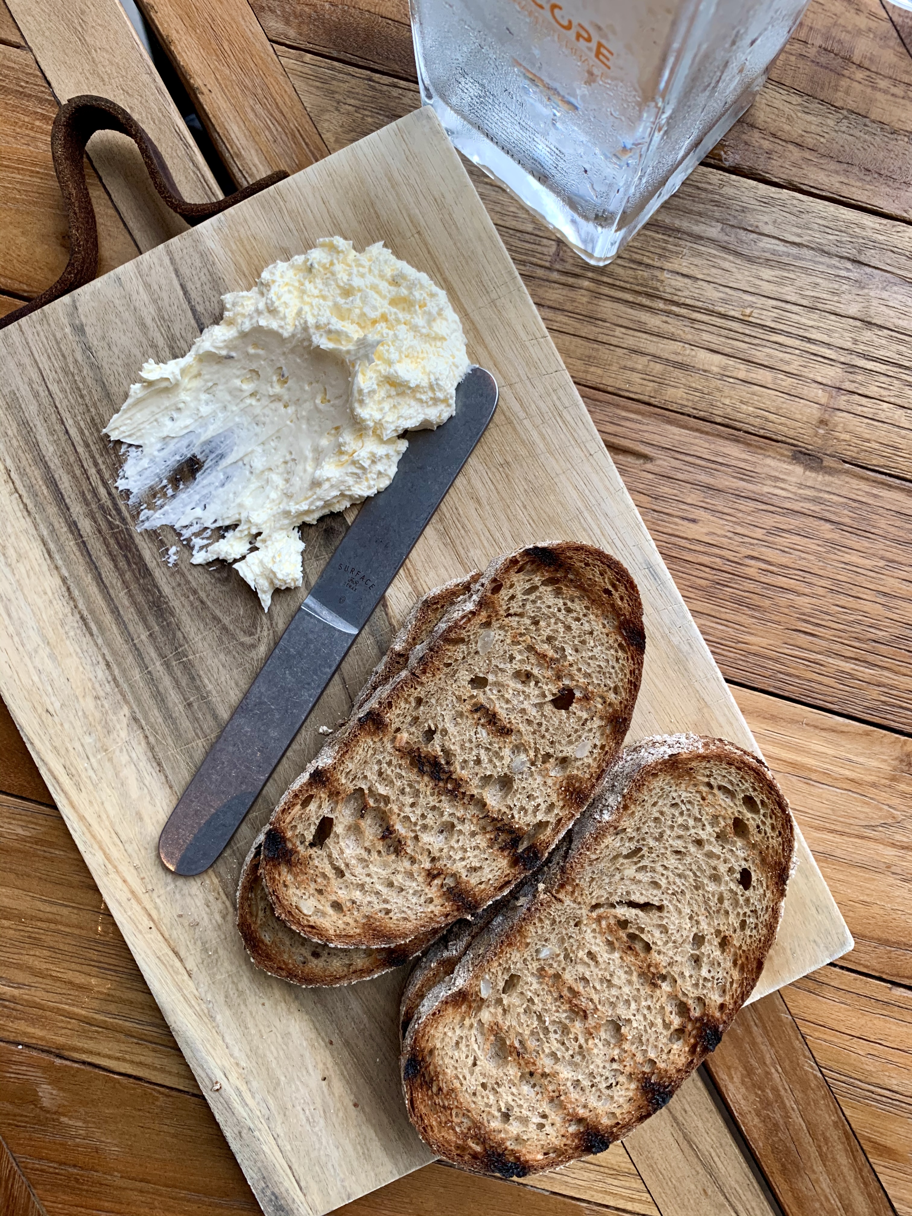 Appetizer with toasted bread and whipped butter