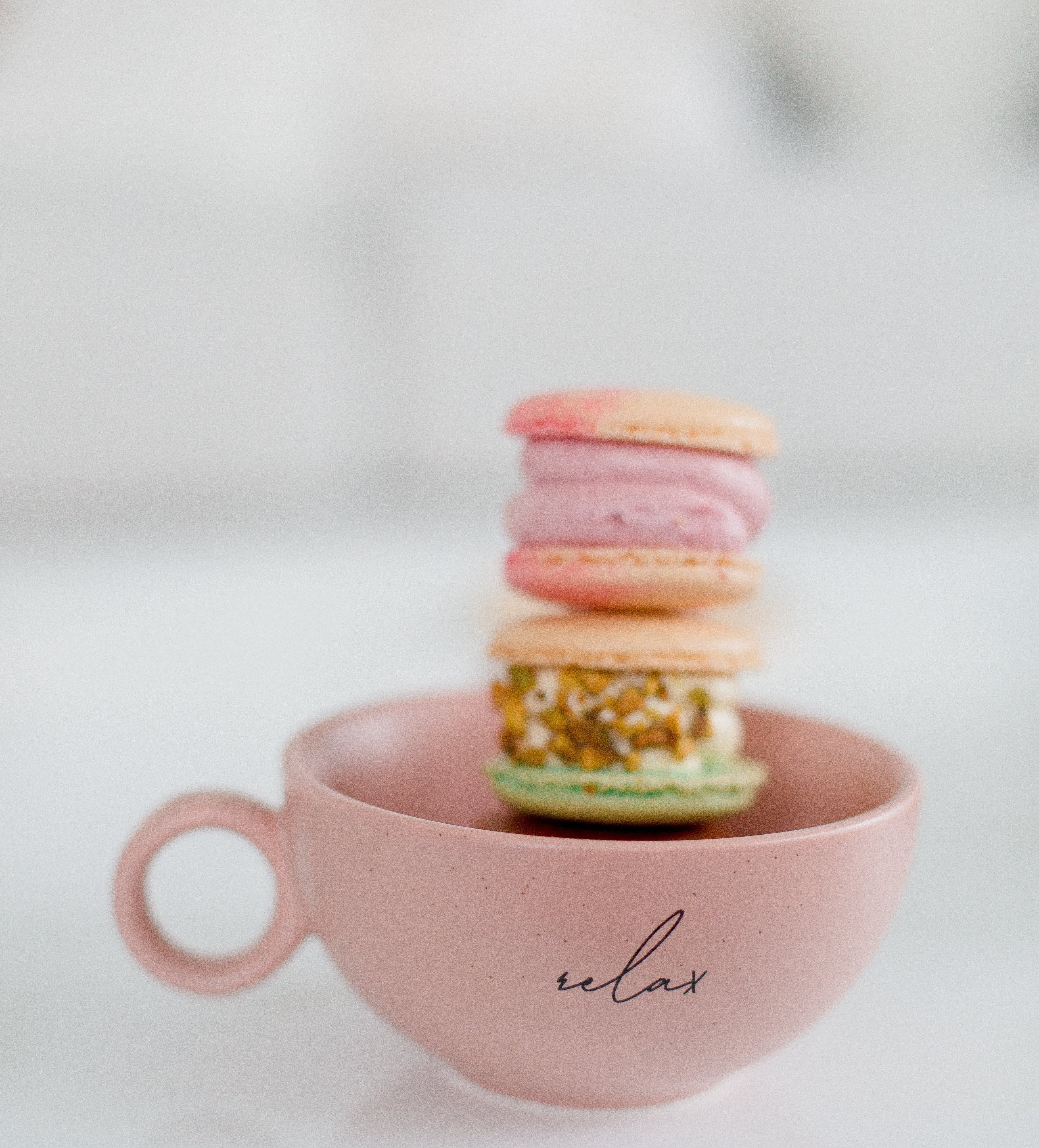 Pink Teacup Filled With Macarons