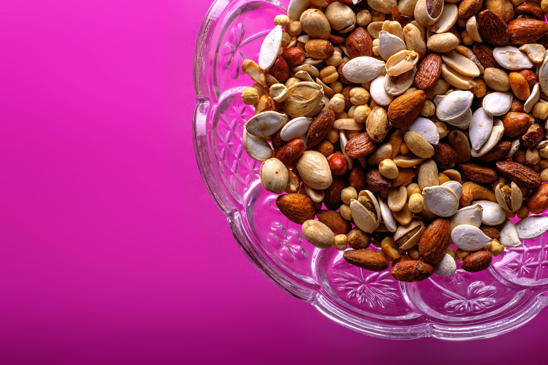  Close Up Of Nuts On Pink Background