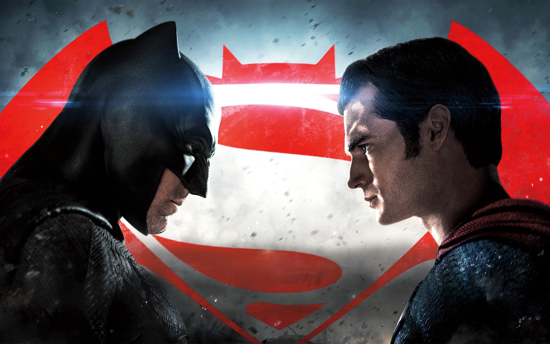 A dramatic scene from *Batman V Superman: Dawn Of Justice*, featuring Batman and Superman glaring at each other against a iconic background featuring the Superman emblem.