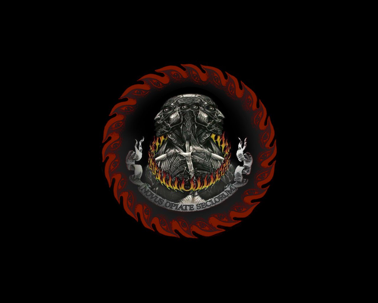 An intricate circular emblem featuring dark and fiery elements, representing the band Tool, known for its emo and progressive music style.