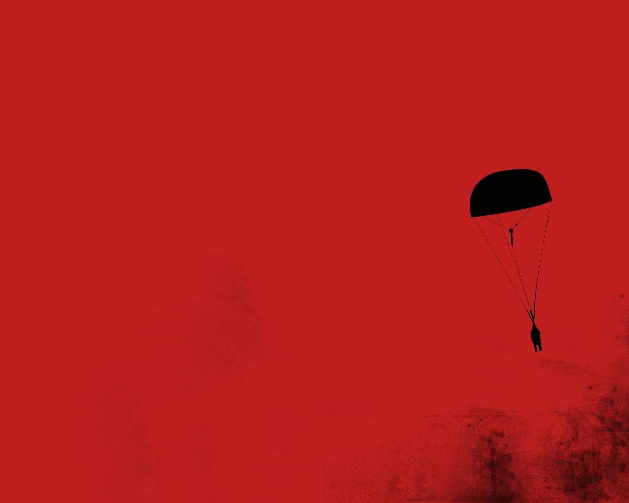 Silhouette of a parachute and lone jumper descending into a textured red sky — parachute, Misc, unknown.