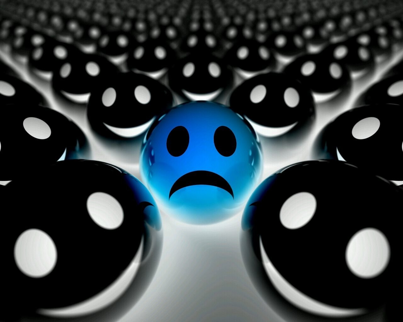 An artistic representation of a blue smiley face amid a crowd of black spheres, creating a striking contrast that highlights emotion and individuality.