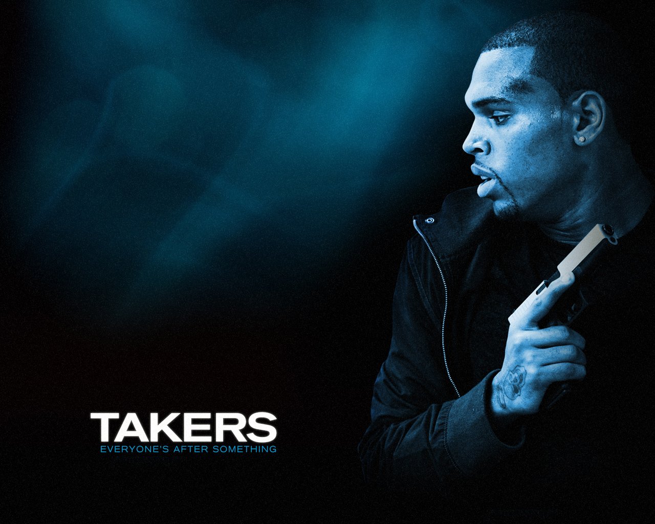 Promotional image for the movie Takers featuring a man holding a gun, looking intently to the side against a dark, smoky background.