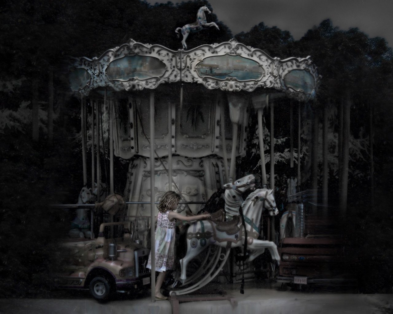 A child stands by a vintage carousel, reaching out to a whimsical horse amidst a dimly lit, forested backdrop, capturing a moment of curiosity and wonder.