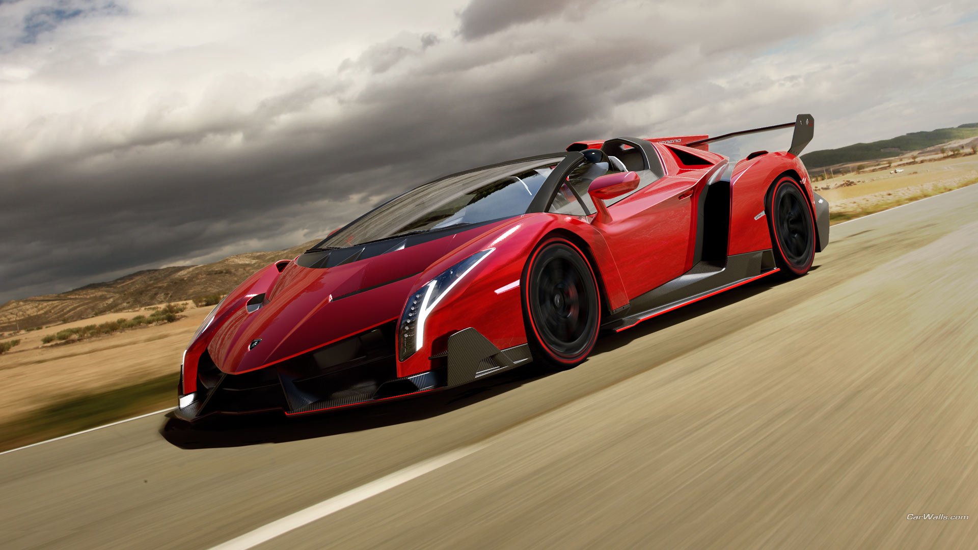 A striking red Lamborghini Veneno Roadster speeds along a highway under a dramatic sky, showcasing its sleek design and sporty features.