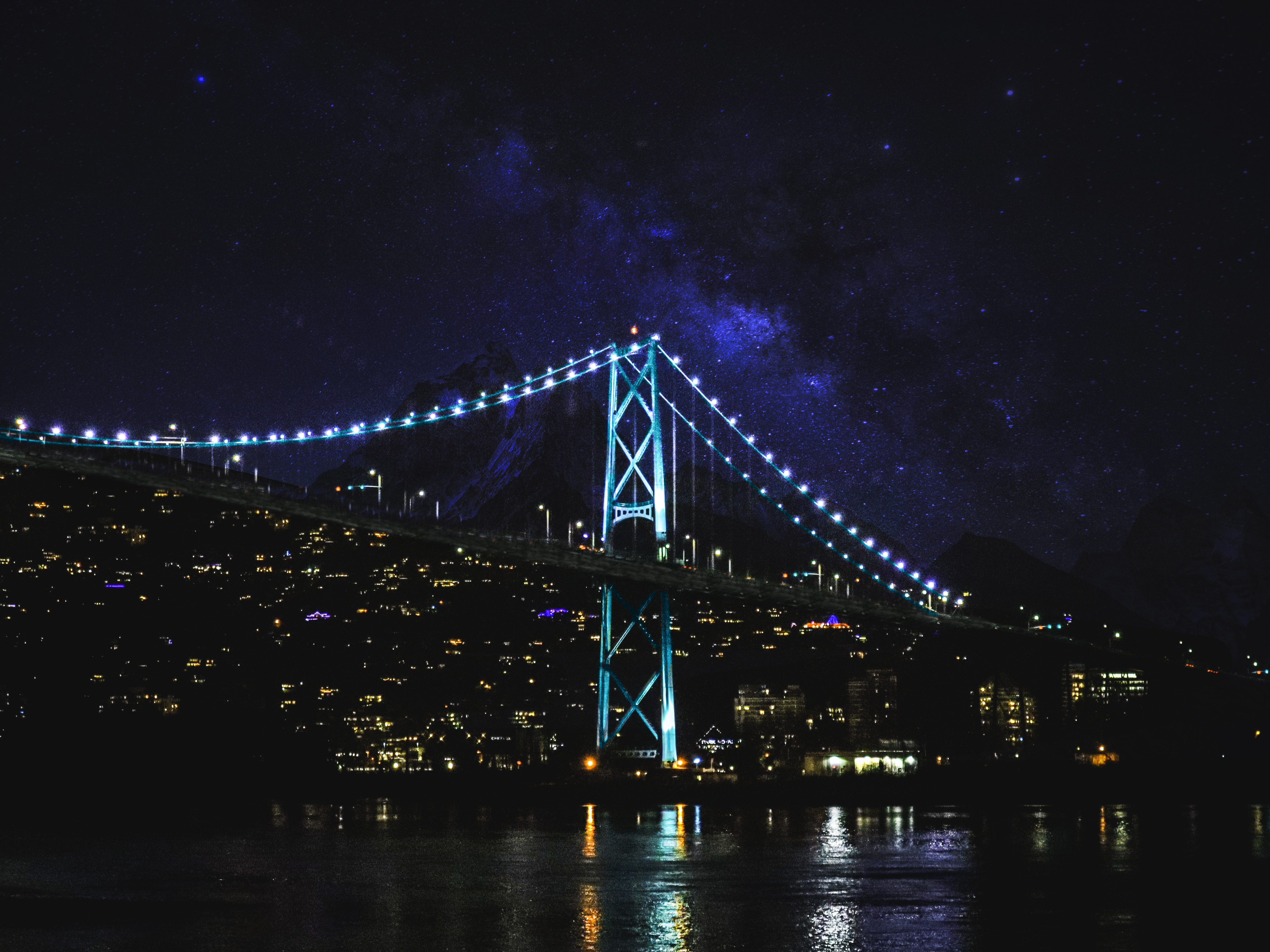 A night capture of Lions Gate Bridge in Vancouver, British Columbia. by Jaskeerat