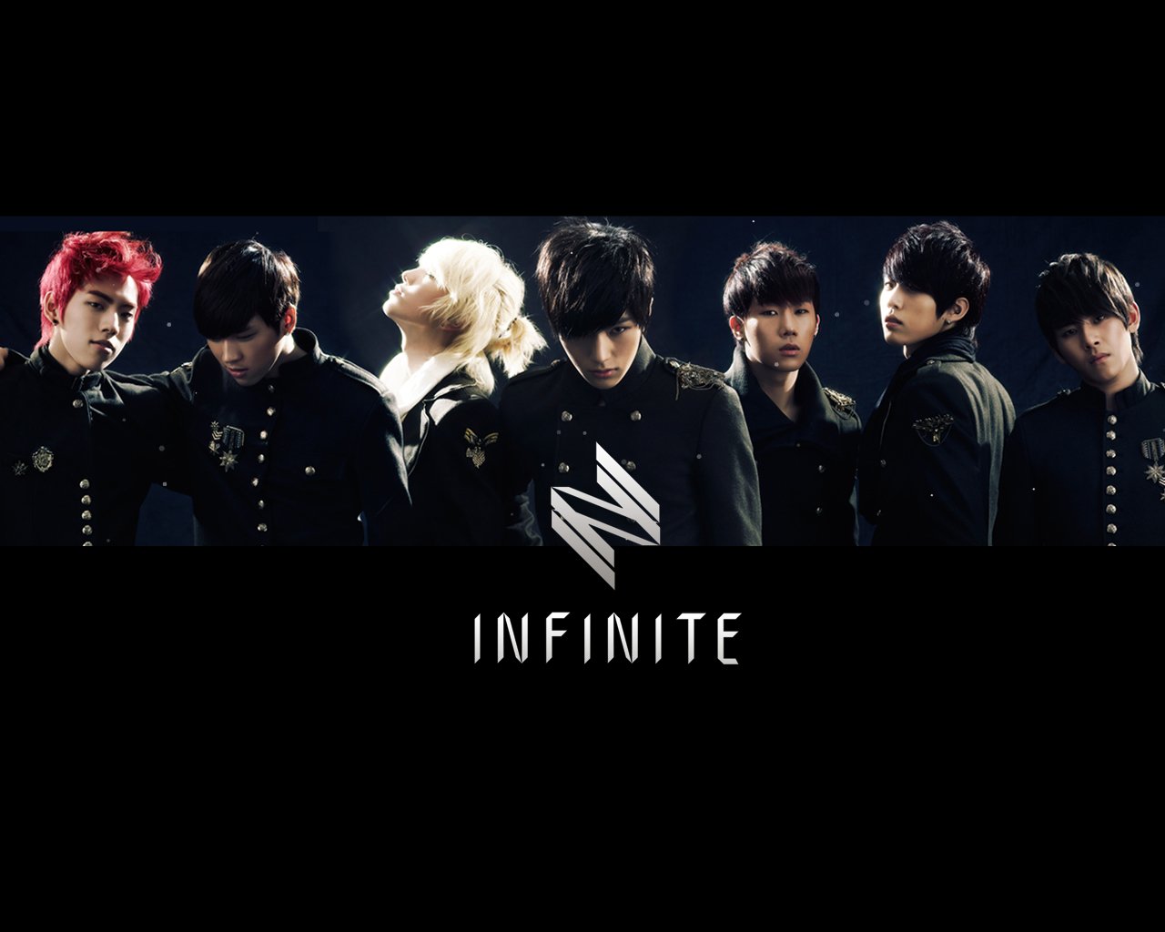 Seven members of the music group Infinite stand side by side in dark outfits against a black background, with the word INFINITE below them.