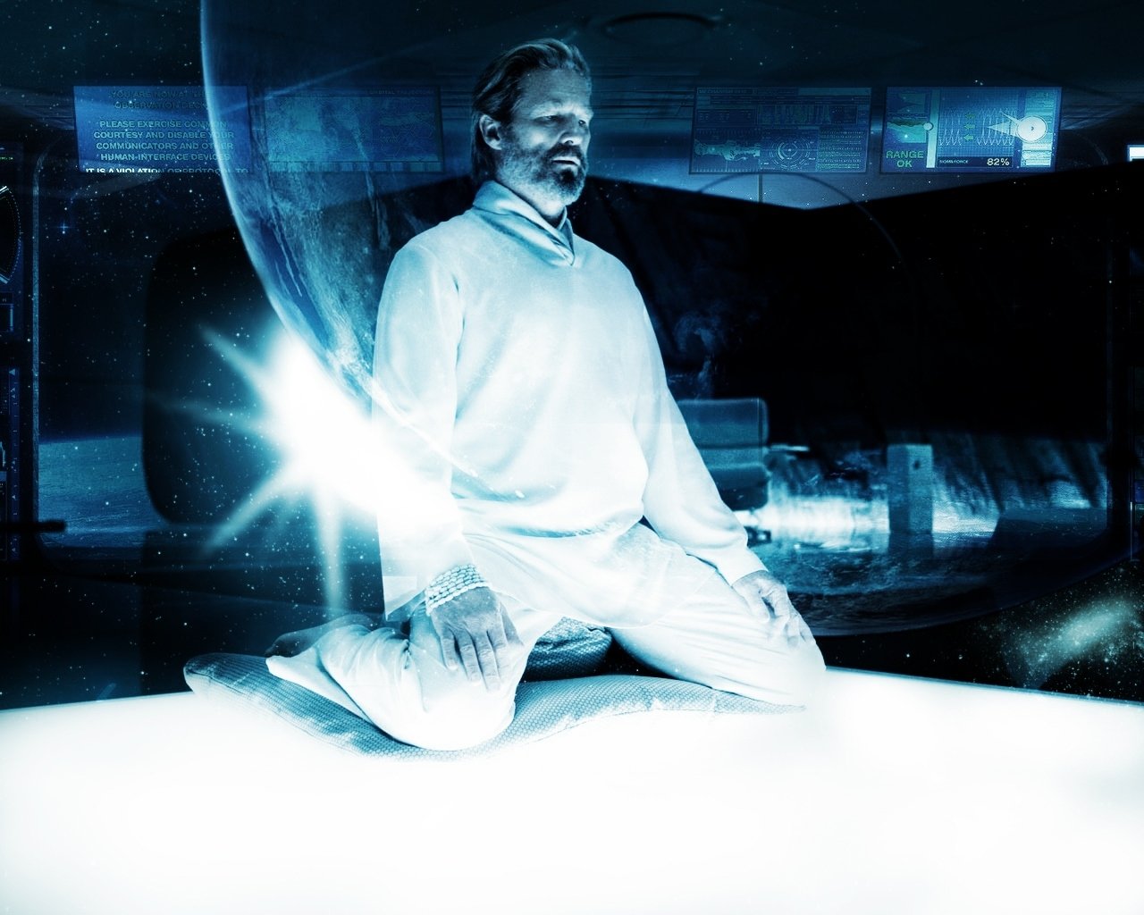 Figure kneels on a glowing white platform inside a blue, digital TRON: Legacy world, bathed in light with holographic screens and futuristic architecture.