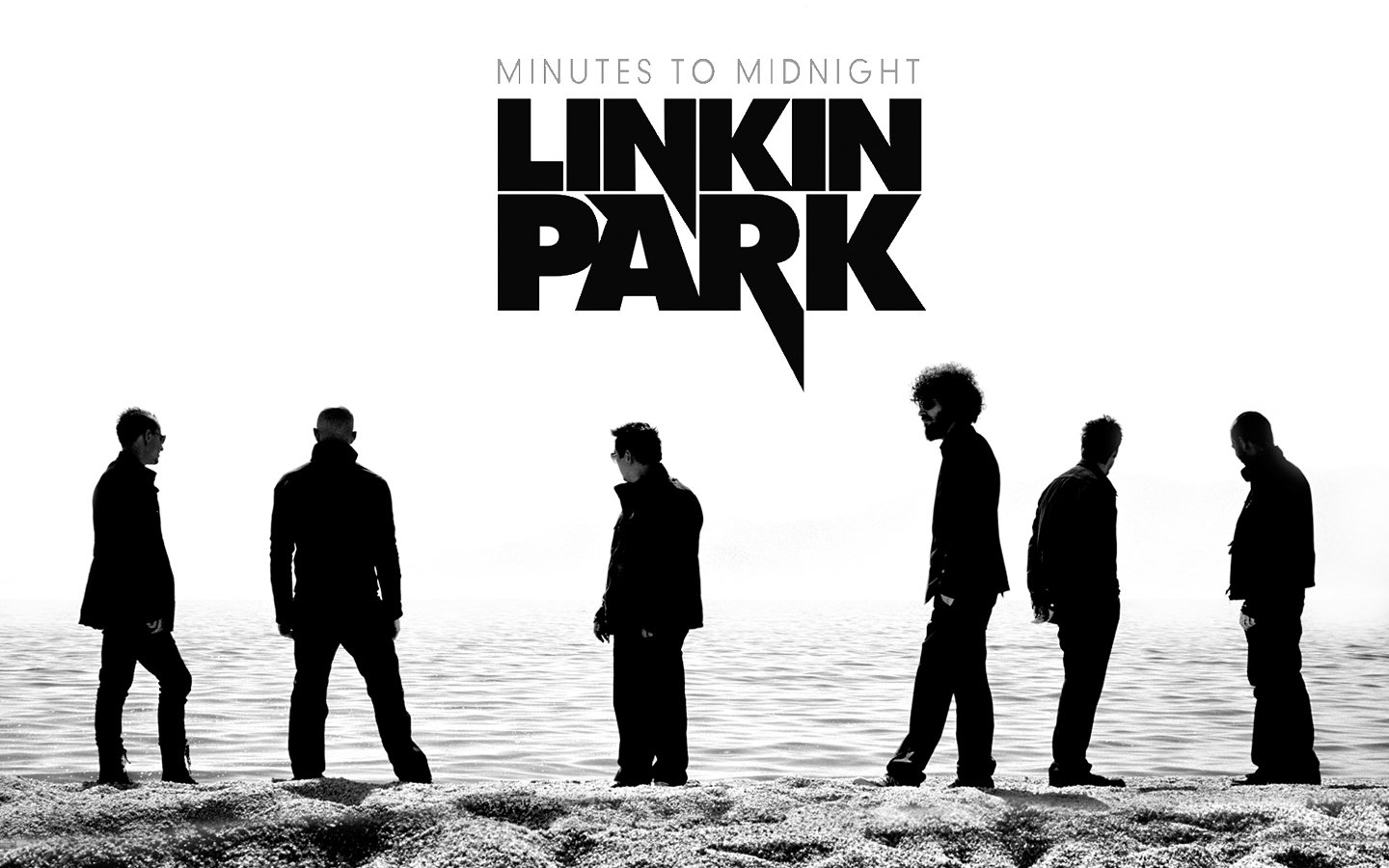 Silhouettes of six band members stand against a serene backdrop, with Linkin Park and Minutes to Midnight boldly displayed, capturing the essence of their iconic music.