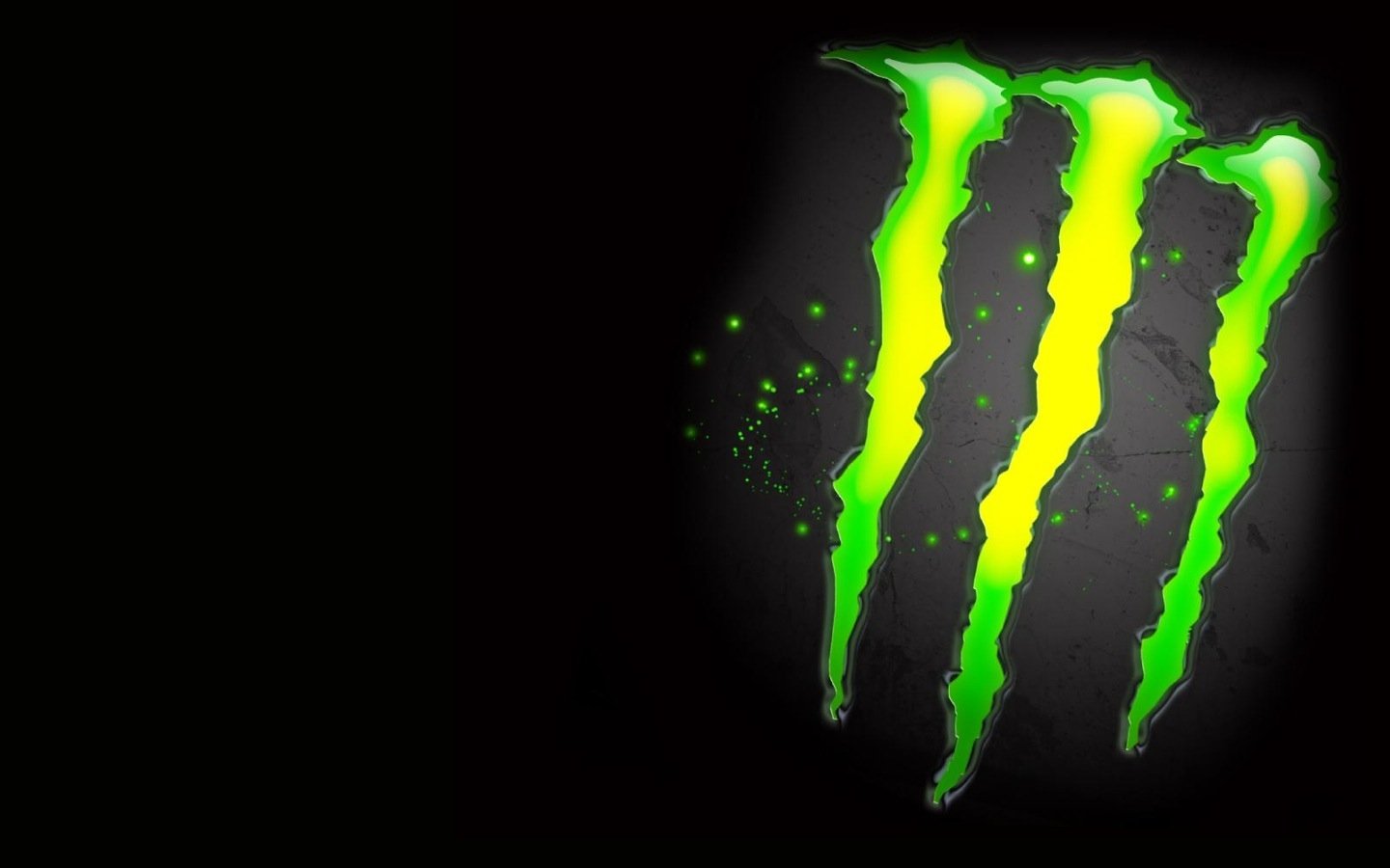 A striking image featuring a bold, man-made design of three green claw marks against a black background, symbolizing an energetic monster brand.