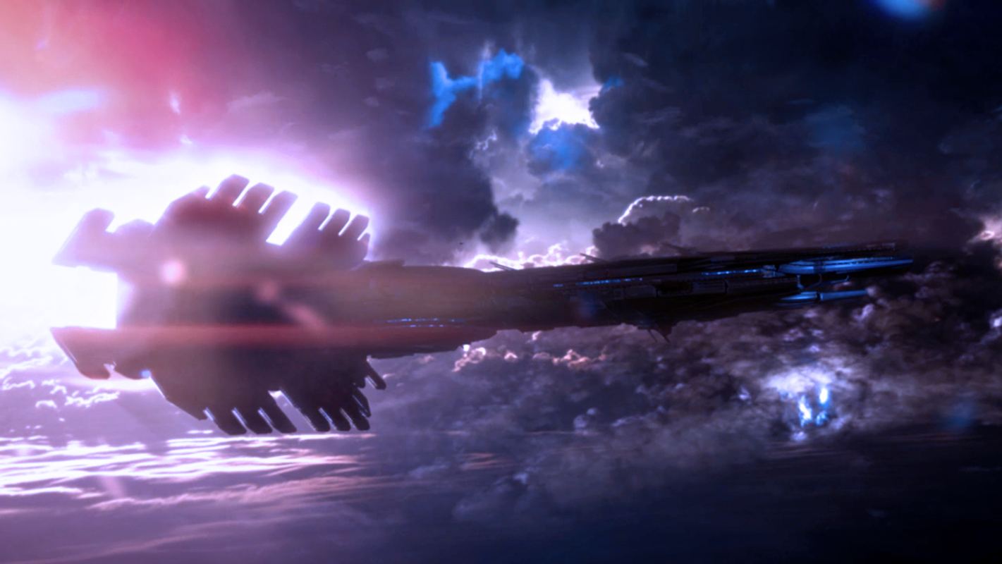 A spaceship from the video game Mass Effect travels through a vibrant, cloudy space environment illuminated by distant stars and nebulae.