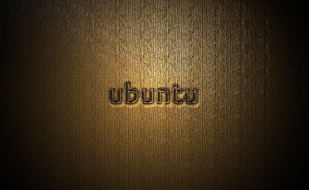 Dark brown wooden texture with the word ubuntu engraved, blending technology and natural elements in a minimalist design.