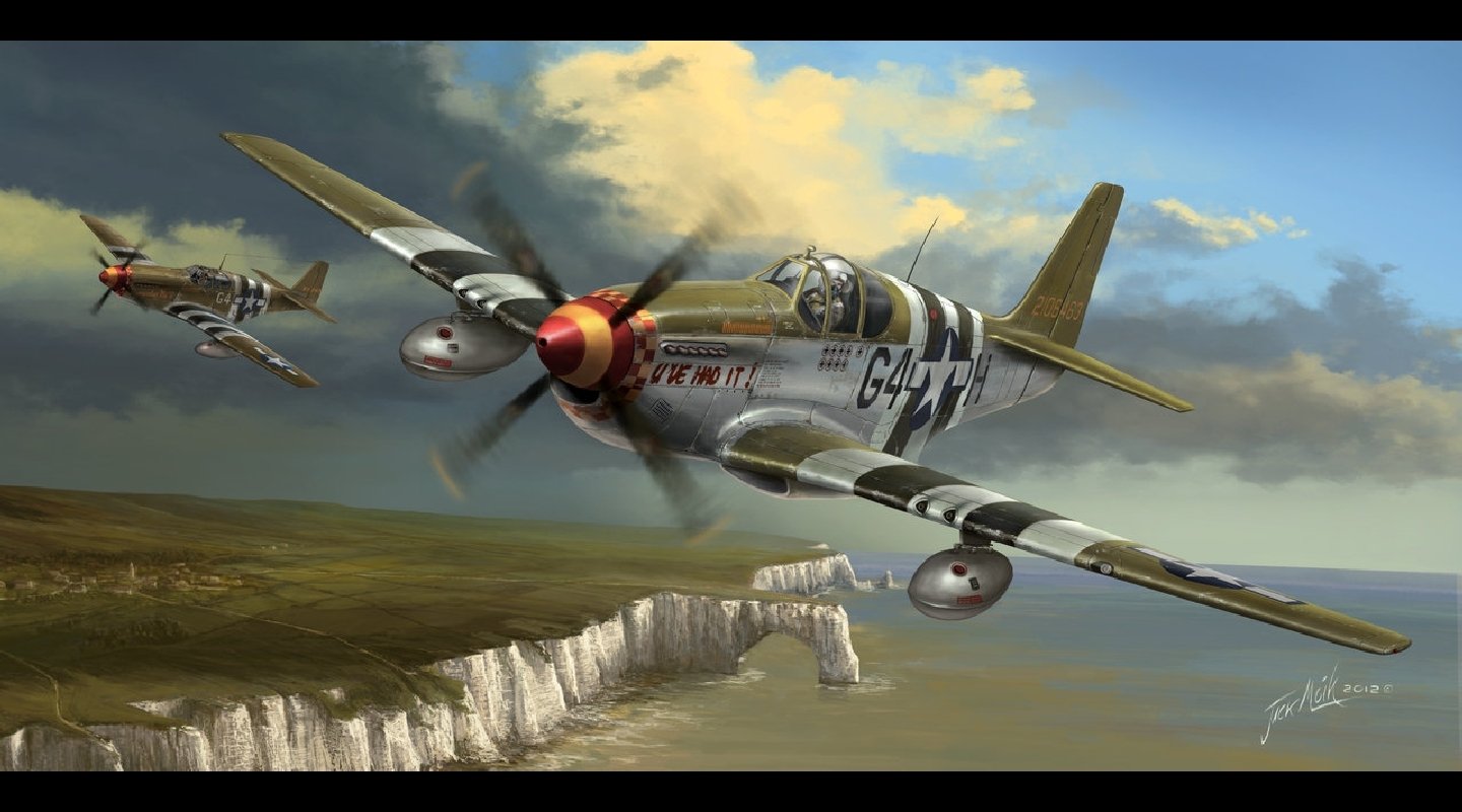 Two military aircraft soar over coastal cliffs under a dramatic sky, showcasing their sleek designs and historical significance in aerial combat.