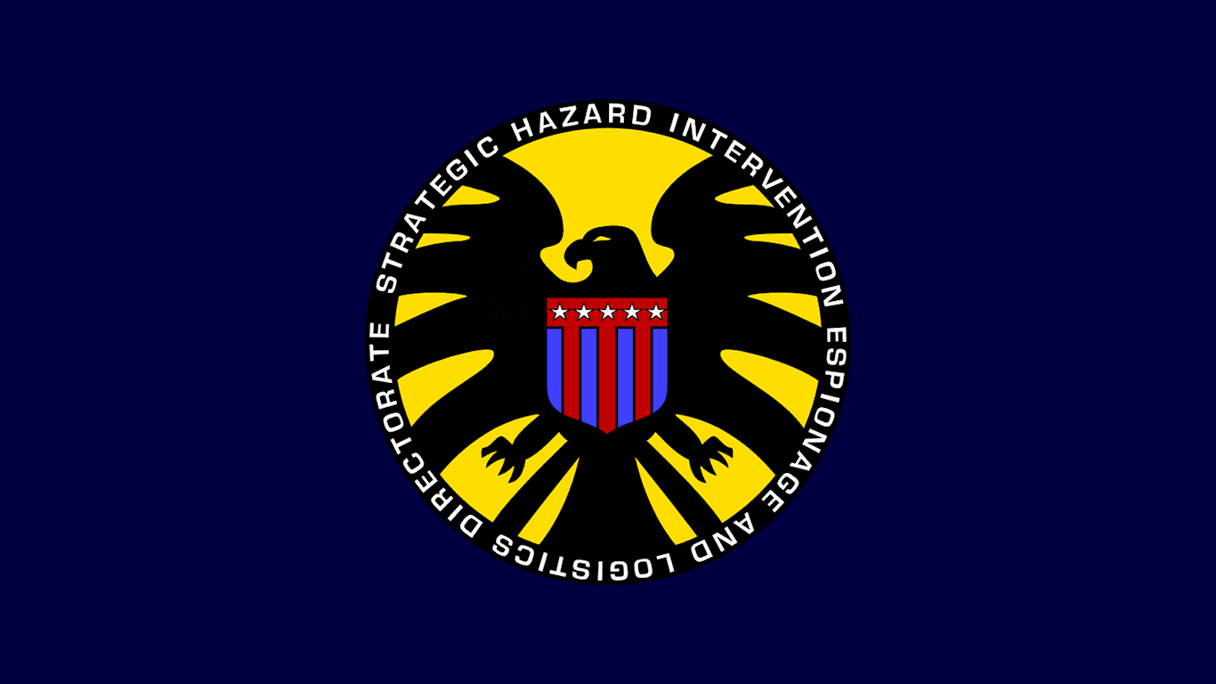 Flag featuring the emblem of S.H.I.E.L.D. from comics, showcasing a stylized eagle with a red and blue shield, set against a yellow background with a dark blue field.