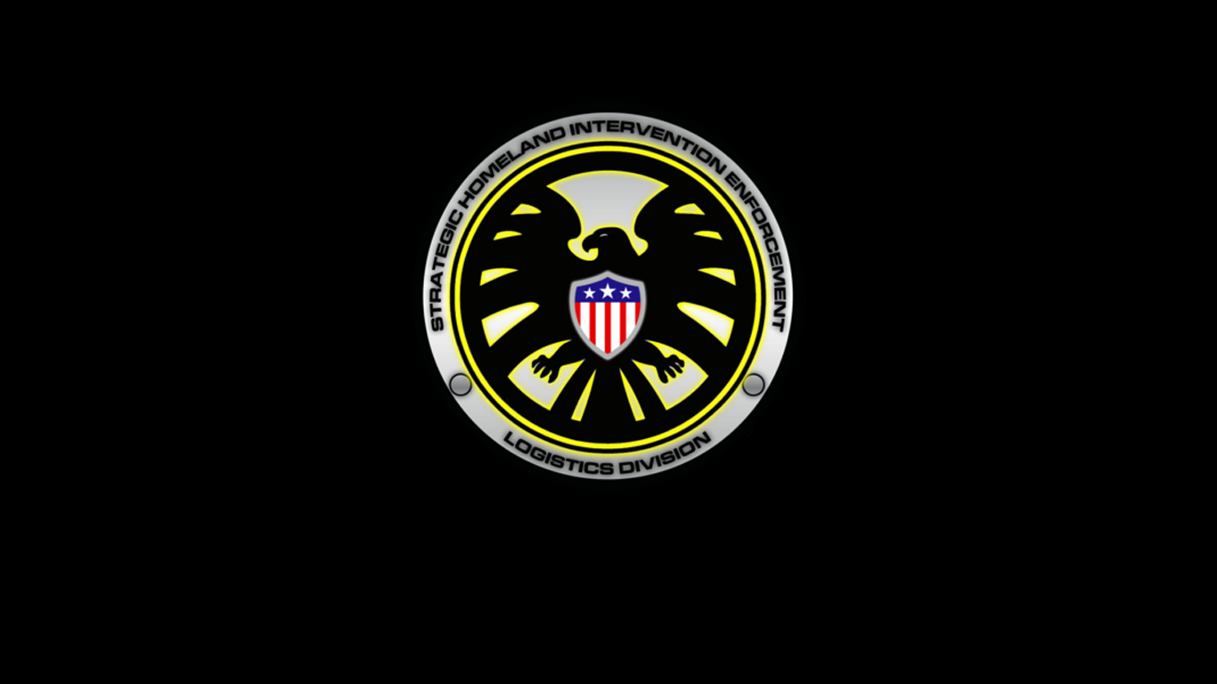 The image features the S.H.I.E.L.D. logo, representing the Strategic Homeland Intervention, Enforcement, and Logistics Division, set against a black background.