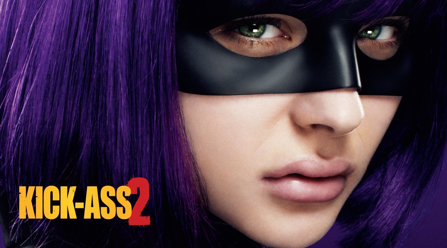 Chloë Grace Moretz as Hit-Girl with purple hair and a black mask in the movie Kick-Ass 2.