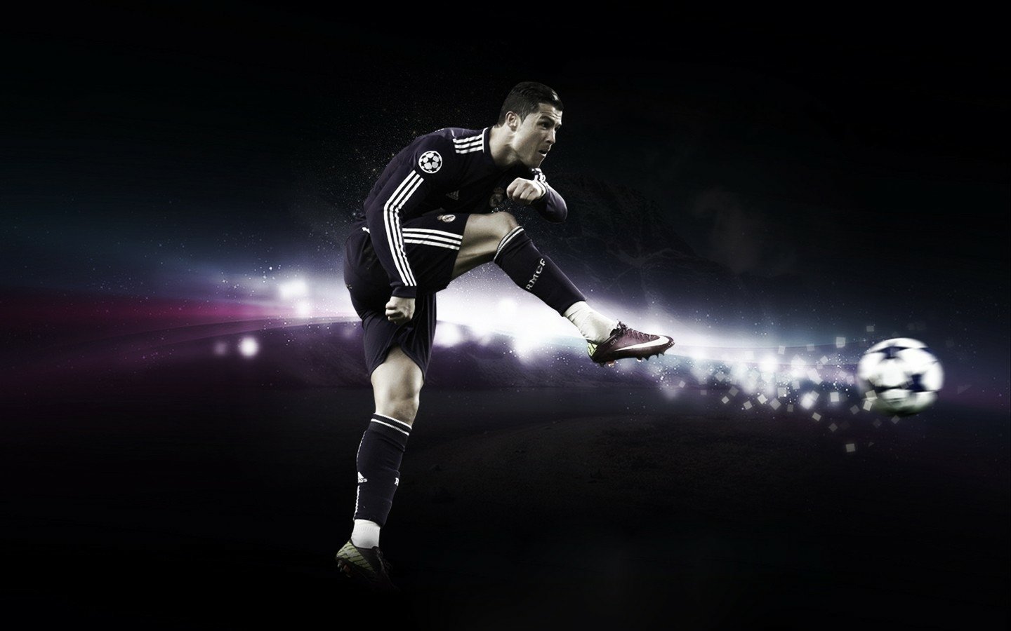 Cristiano Ronaldo, in a dark Real Madrid C.F. uniform, executes a powerful kick towards a football, set against a dynamic, illuminated background showcasing athletic energy.
