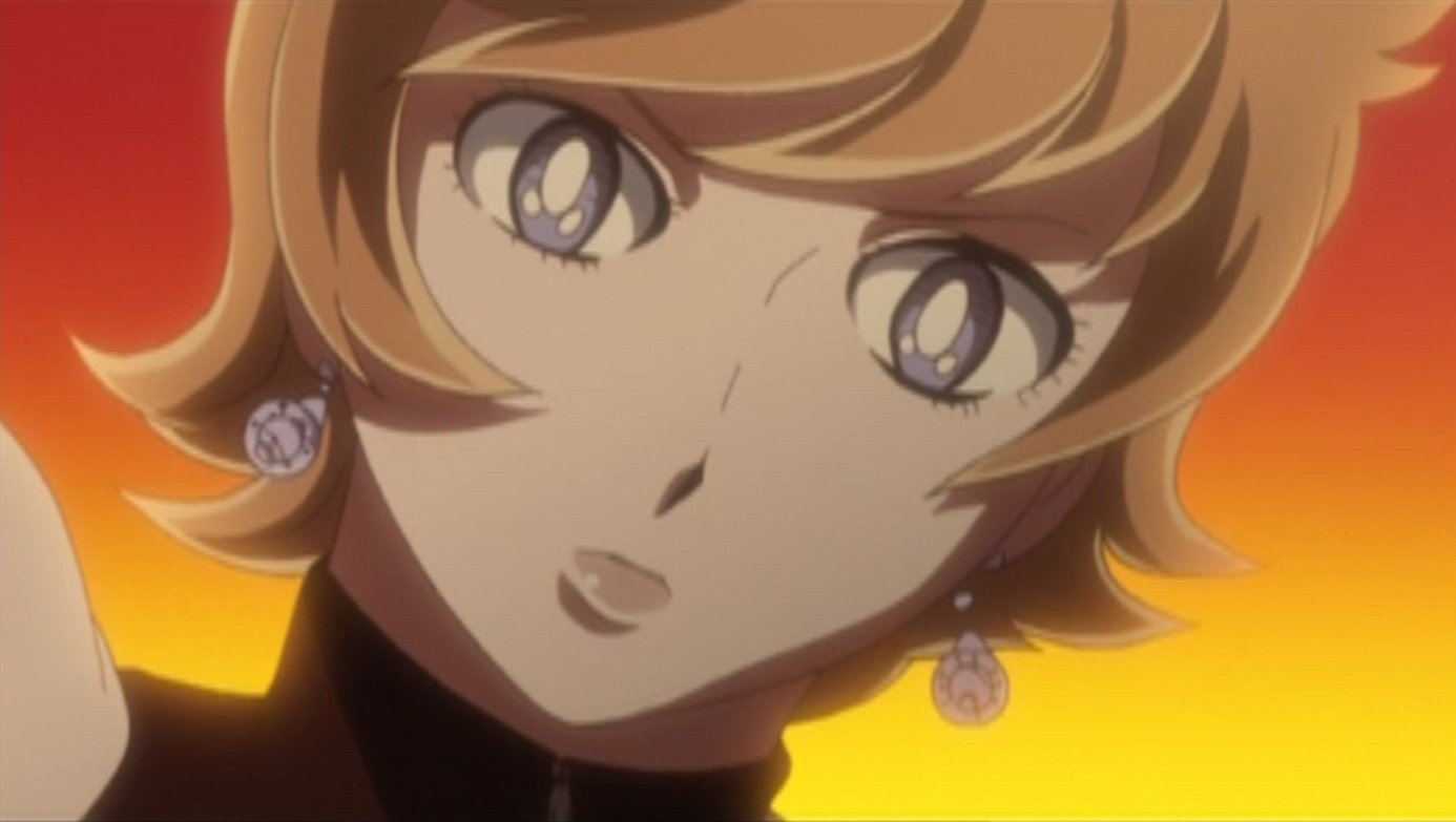 Close-up of anime character Mylene Hoffman from 009-1: short blond hair, wide gray eyes, dangling earrings, wearing a dark collar against a warm orange-yellow background.