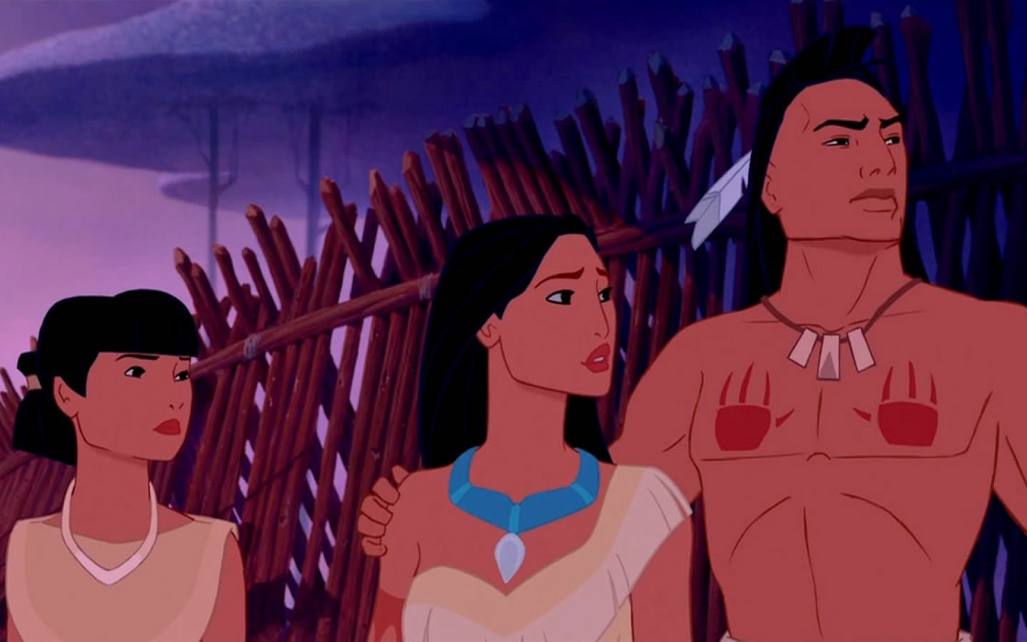 Three animated characters from the movie Pocahontas stand together, with a backdrop of wooden structures and a twilight sky, expressing concern and determination.