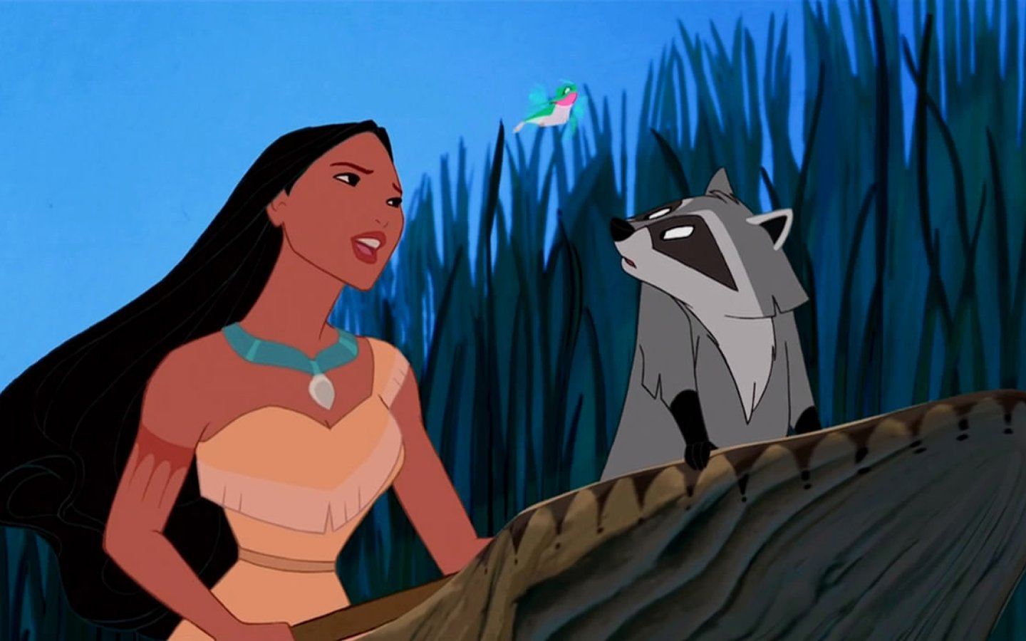 Pocahontas stands atop a log, engaging with a raccoon while a colorful bird flutters nearby, set against a backdrop of lush greenery in this animated scene.