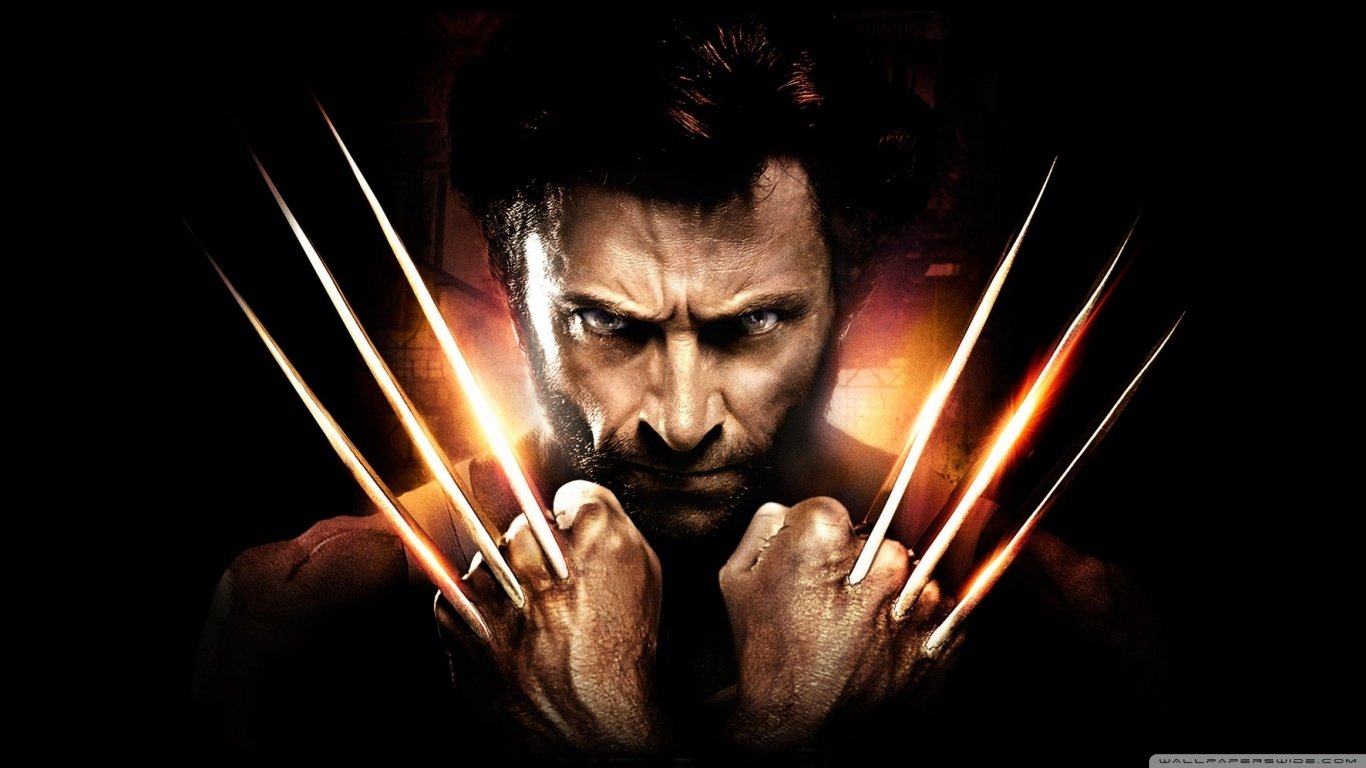 Wolverine from The Wolverine movie, with claws extended and intense expression against a dark background.
