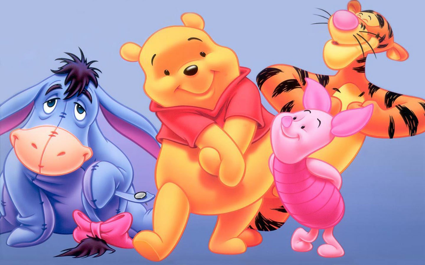 A vibrant scene from the TV show Winnie the Pooh featuring Pooh, Tigger, Piglet, and Eeyore joyfully posing together against a soft background.