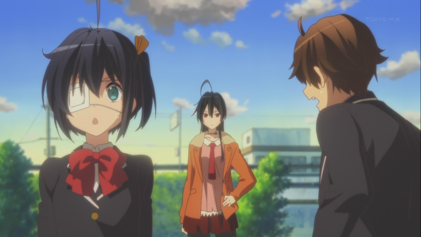 Tōka Takanashi, Yūta Togashi, and Rikka Takanashi from the anime Love, Chunibyo & Other Delusions stand outdoors under a blue sky with clouds.