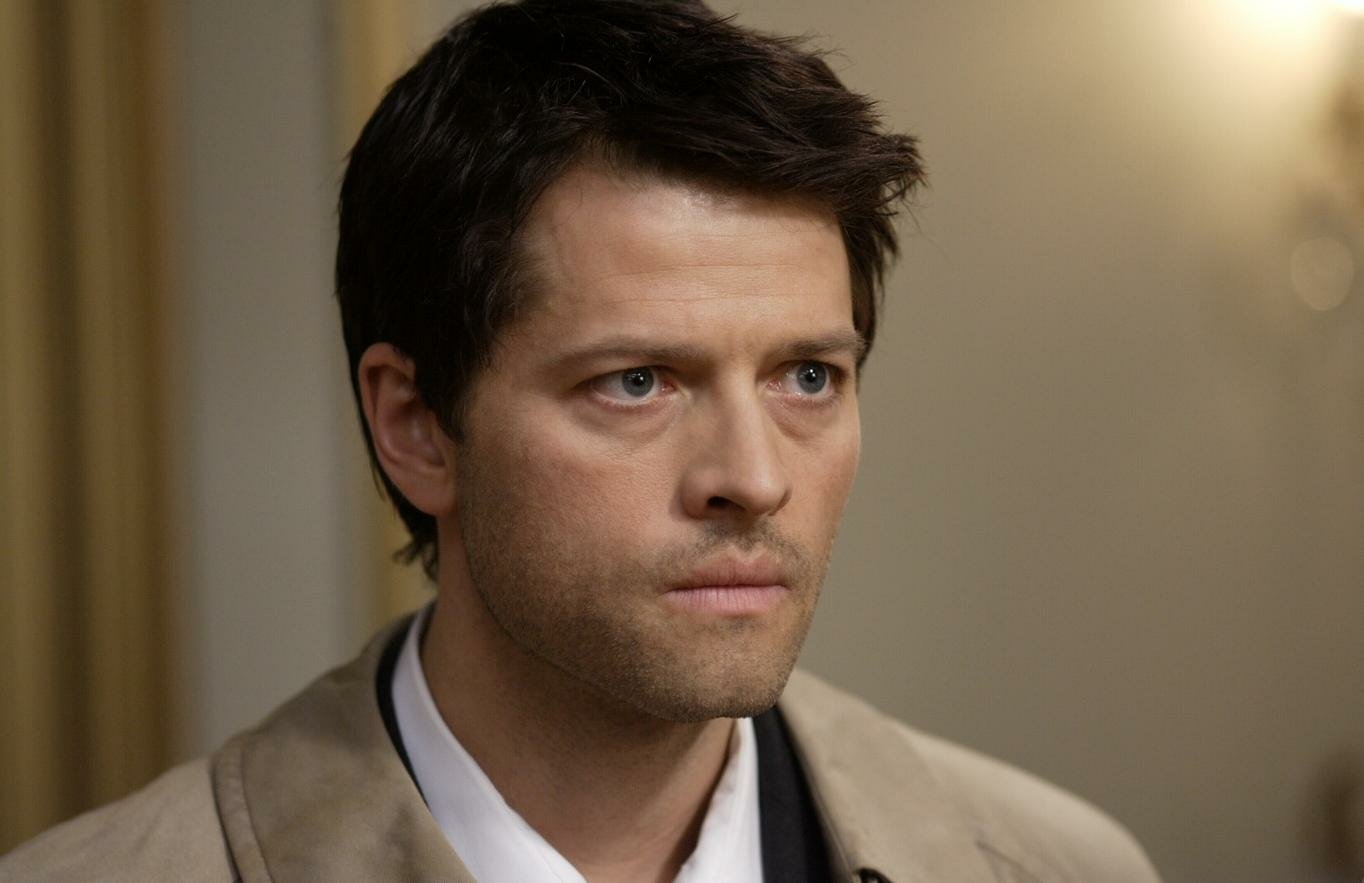Misha Collins portrays Castiel in a dramatic moment from the TV show Supernatural, highlighting the character's intense and contemplative expression.