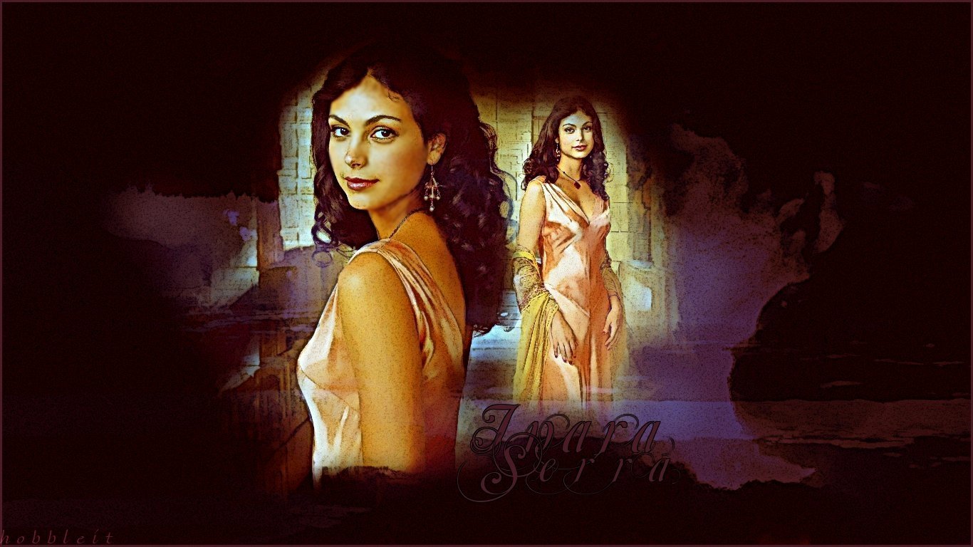 Poster-like image for the movie Serenity (2005): a woman in a pale satin gown appears twice—close three-quarter portrait and full-length reflection—against a moody, sepia-toned background.