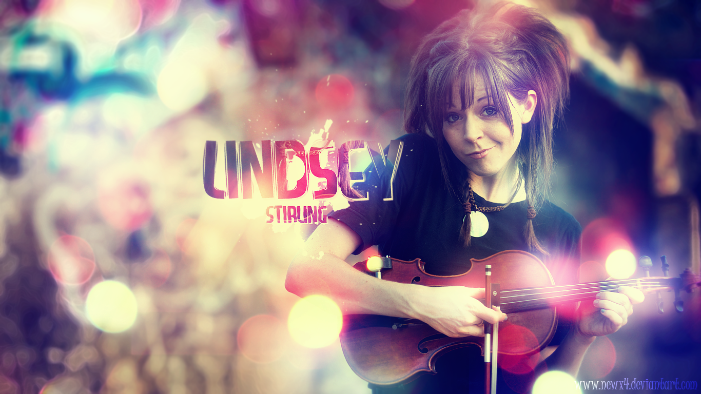 Violinist Lindsey Stirling plays her violin with a dreamy, colorful background blending music and light effects.