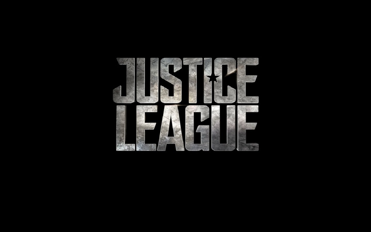 The image features the bold, metallic logo of the Justice League, set against a black background, embodying the essence of superhero comics and movies.