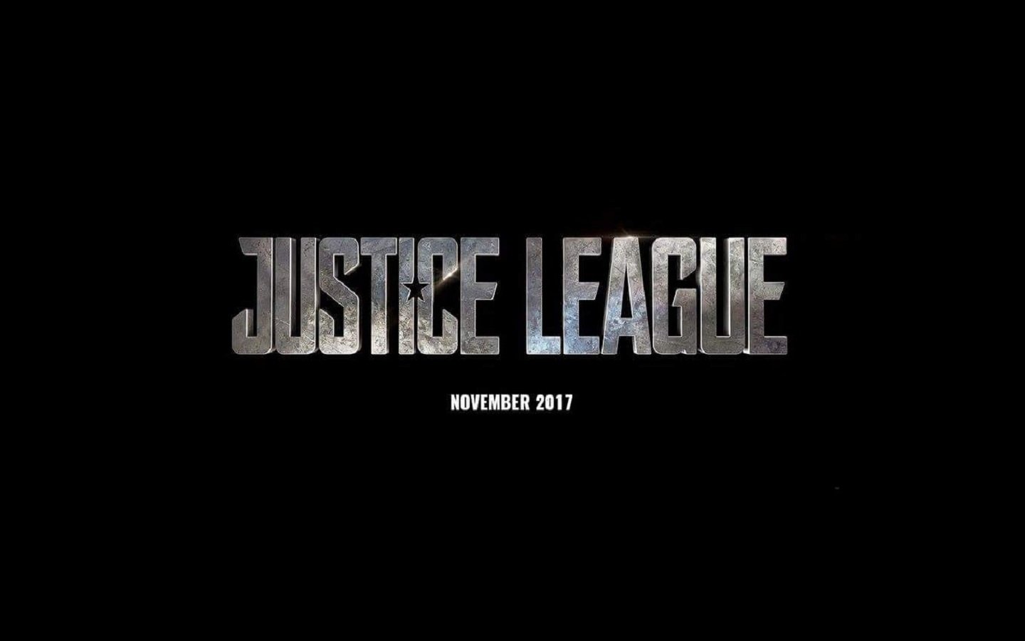A bold black background features the metallic logo of the superhero movie Justice League, with the release date displayed as November 2017.