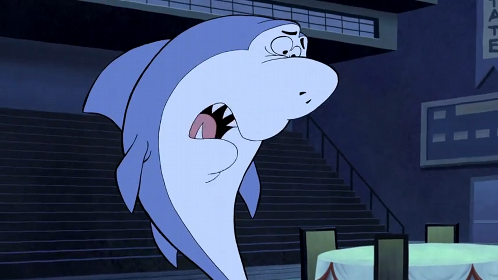 Scene from the TV show Jabberjaw featuring the animated shark character looking concerned in a dimly lit room.