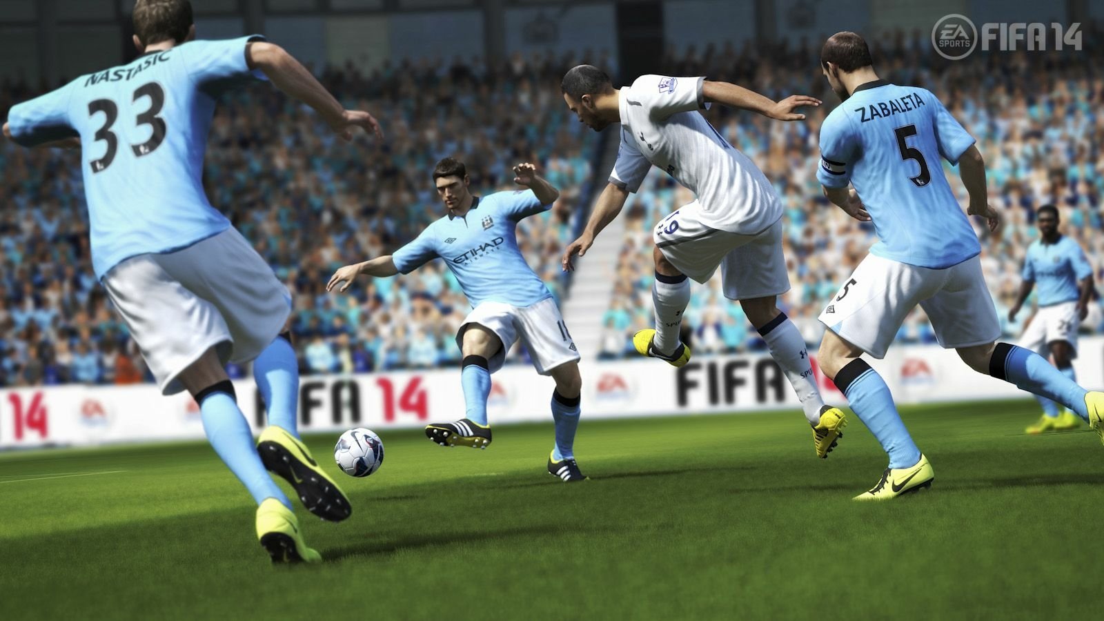 In a dynamic scene from FIFA 14, players in blue jerseys maneuver around opponents while competing for the ball on a vibrant soccer field.