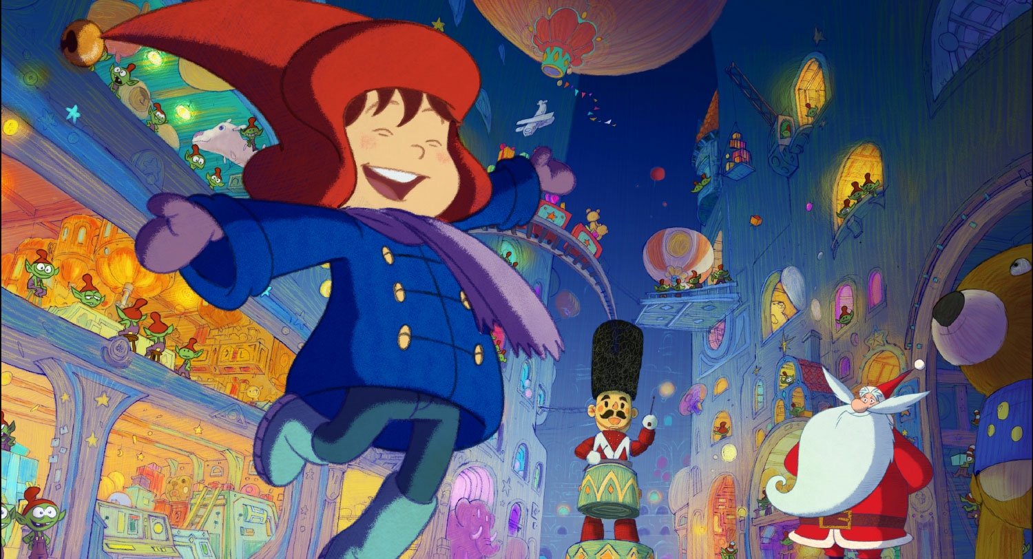 Scene from the movie Santa's Apprentice showing a joyful child in winter clothes in a colorful, festive workshop filled with toys and holiday decorations.