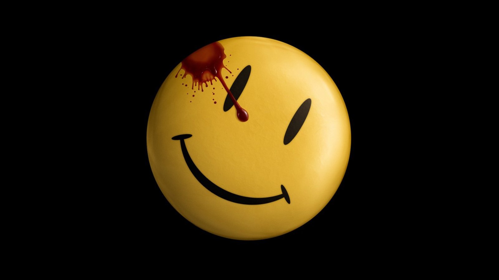 A yellow smiley face button with a blood splatter and an X-shaped eye, iconic imagery from the Watchmen comic.