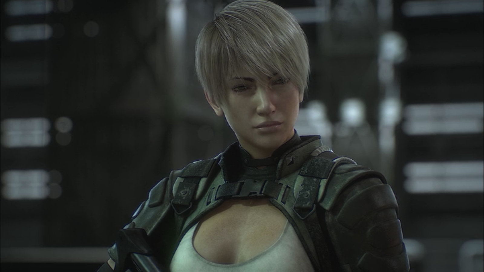 Close-up of a cyberpunk anime character from Appleseed Alpha with short blond hair in tactical armor, set against a dim, industrial background.