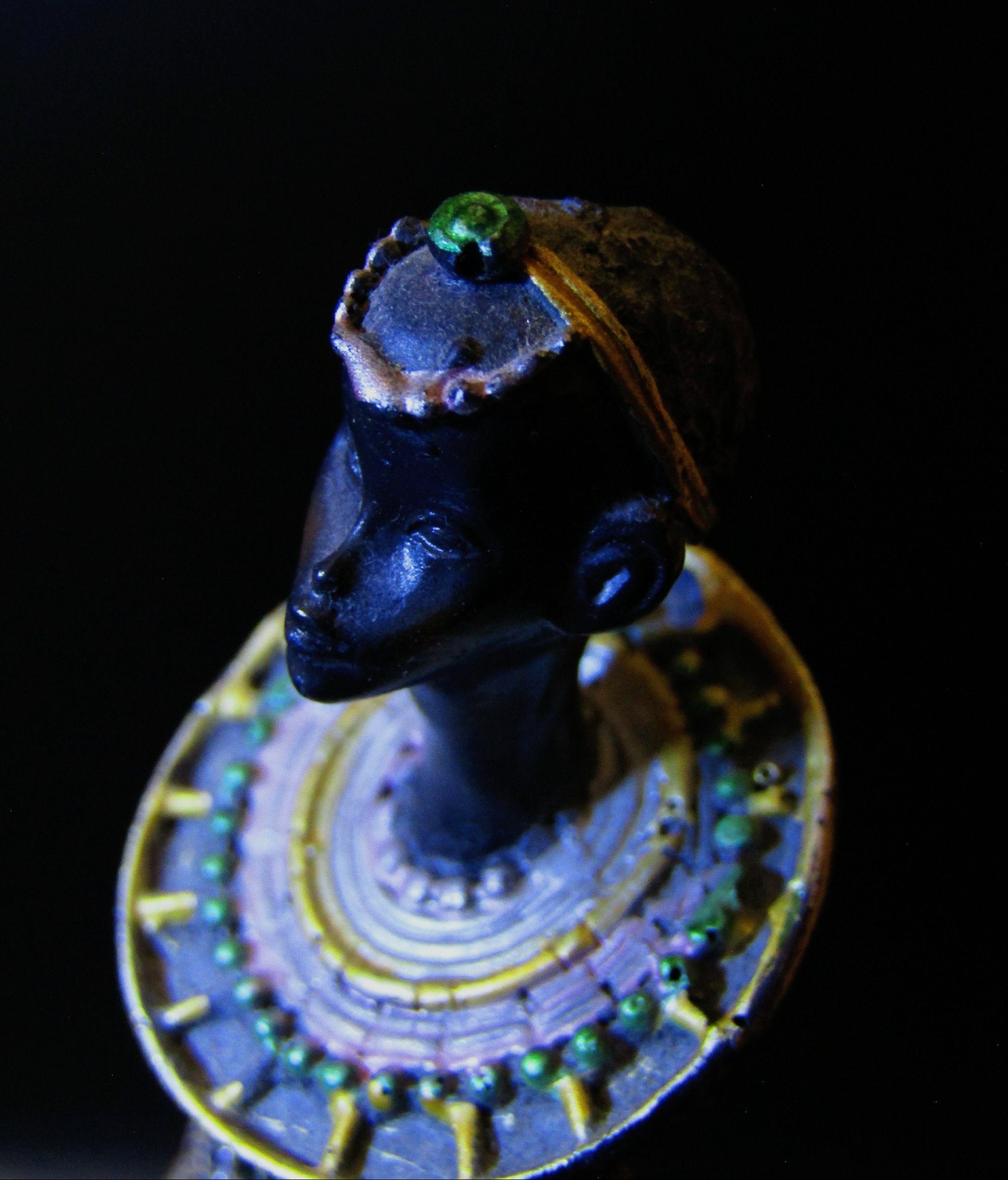 Female figurine in African tribal attire. by Demasc1