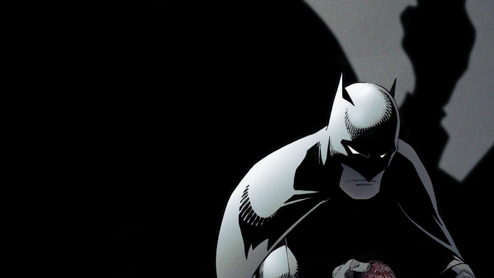 Comic-style Batman — a dark, black-clad superhero crouches in shadow with an ominous silhouette looming behind him.