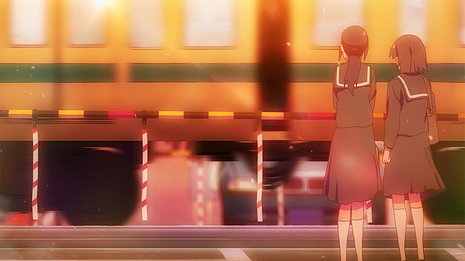 Two girls in school uniforms stand by a train crossing at sunset, capturing a serene moment from the anime Sakurasou no Pet na Kanojo.