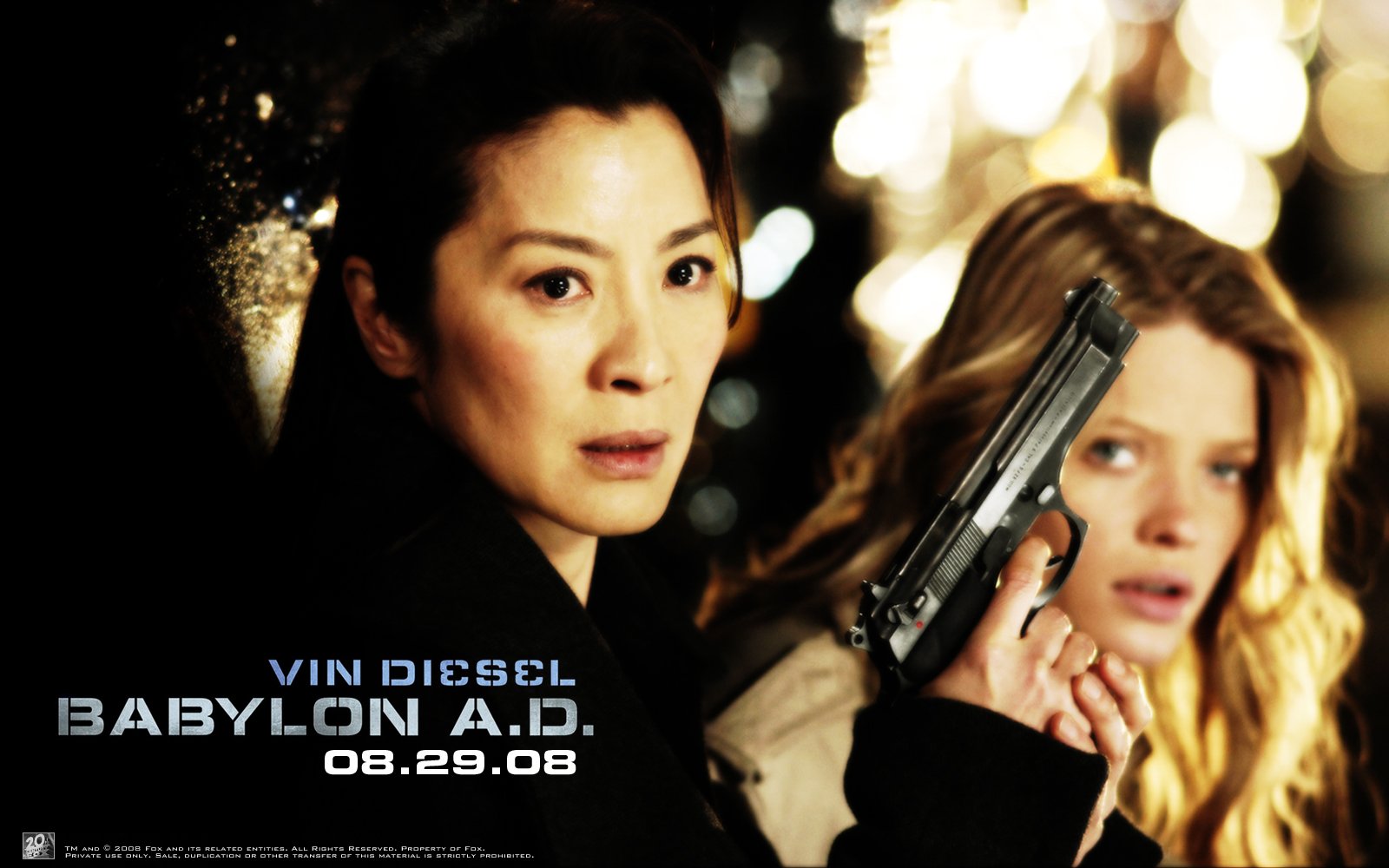 Michelle Yeoh and Mélanie Thierry in a tense scene from the movie Babylon A.D., with Yeoh holding a handgun.