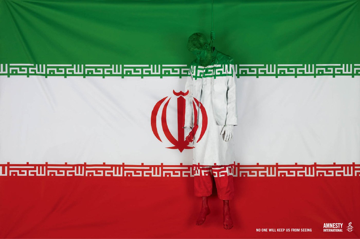 A mannequin dressed in a white outfit stands against the Iranian flag, symbolizing military issues. This image is associated with Amnesty International's advocacy work.