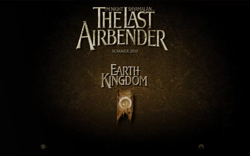 Title card for the movie The Last Airbender featuring Earth Kingdom text and symbol on a dark textured background.